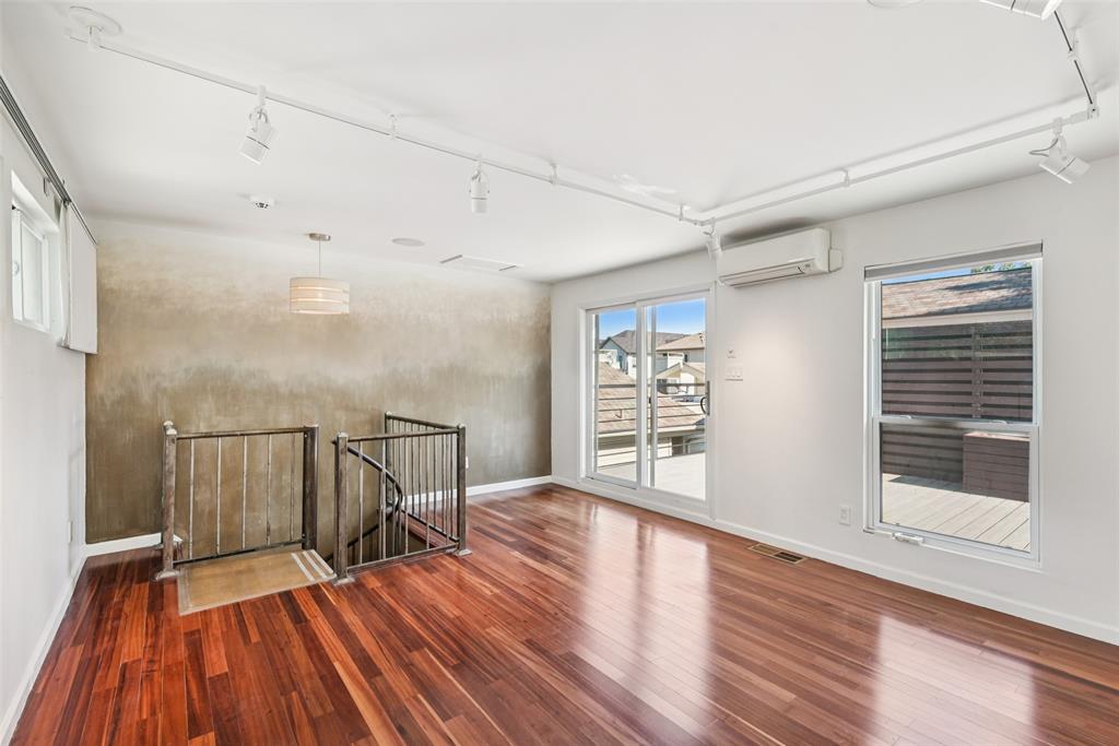 4102 Bowser Avenue, Unit 1 Dallas, TX 75219 - Photo 29 of 33 Light-filled third-floor retreat ideal for a home office, gym, or media lounge.