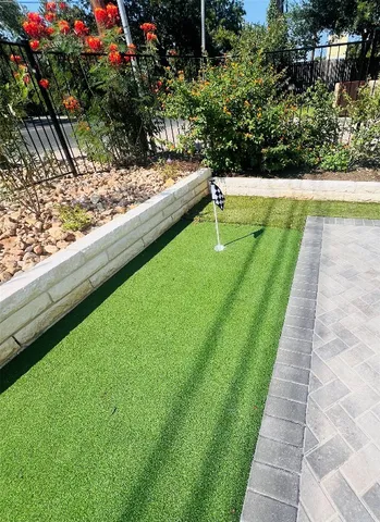 a view of swimming pool from a balcony