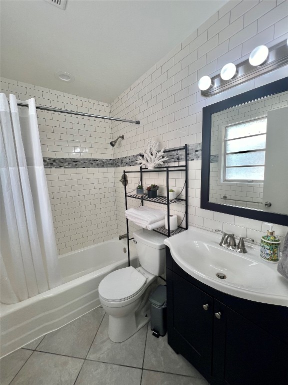 1715 Bluebonnet Lane, Unit A Austin, TX 78704 - Photo 9 of 13 a bathroom with a sink toilet and shower