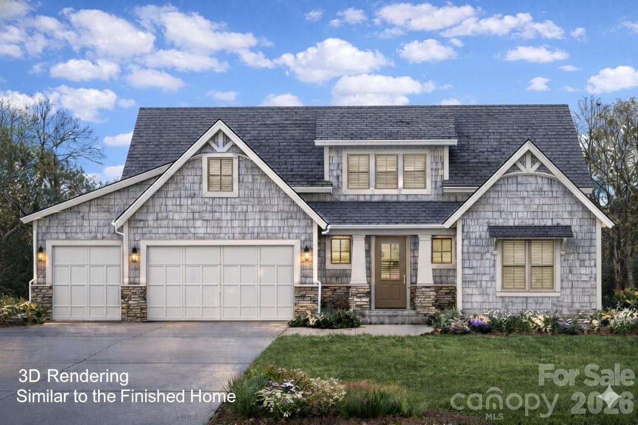 4614 Quiet Rail Court, Unit E2 Lancaster, SC 29720 - Photo 1 of 13 a front view of a house with a yard