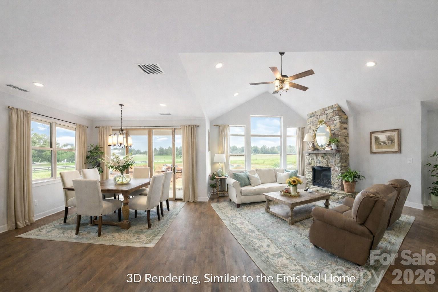 4614 Quiet Rail Court, Unit E2 Lancaster, SC 29720 - Photo 4 of 13 a dining room with furniture a chandelier and a rug