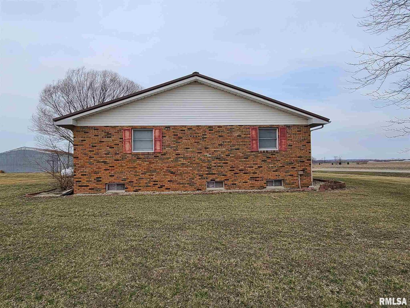 1564 East 300 N Road Cowden, IL 62422 - Photo 18 of 50 a view of a house with a yard