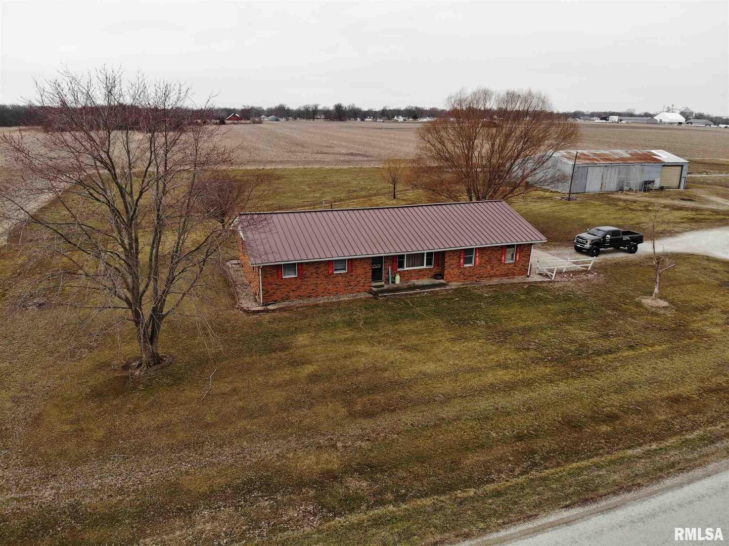 1564 East 300 N Road Cowden, IL 62422 - Photo 2 of 50 a view of a lake with houses