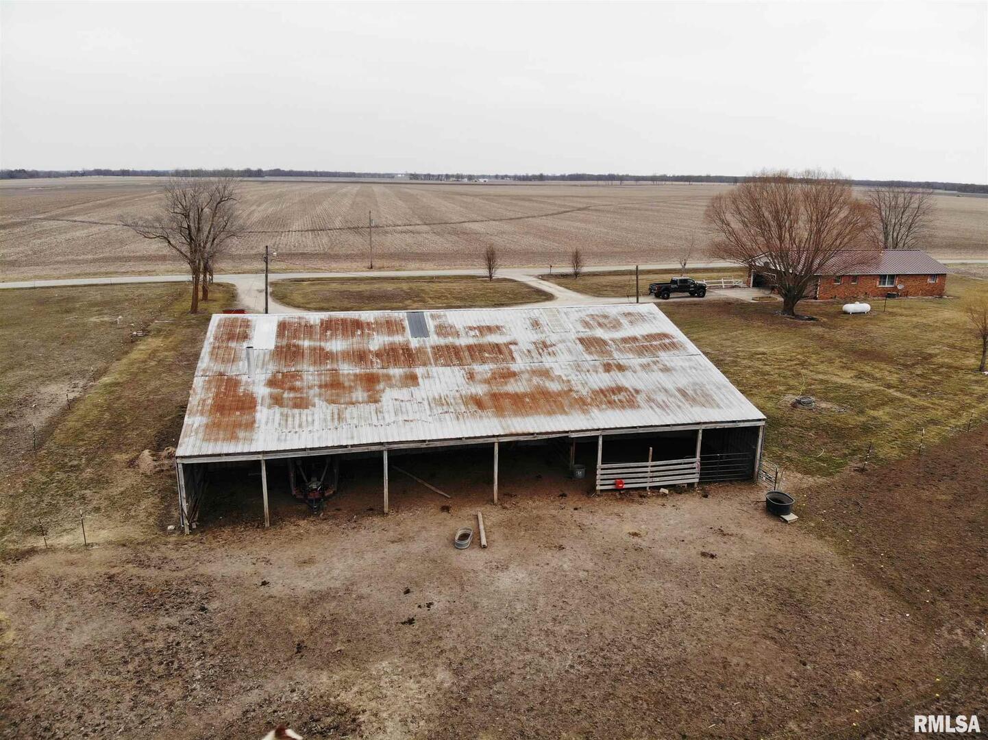 1564 East 300 N Road Cowden, IL 62422 - Photo 9 of 50 a view of a terrace with a table and chairs
