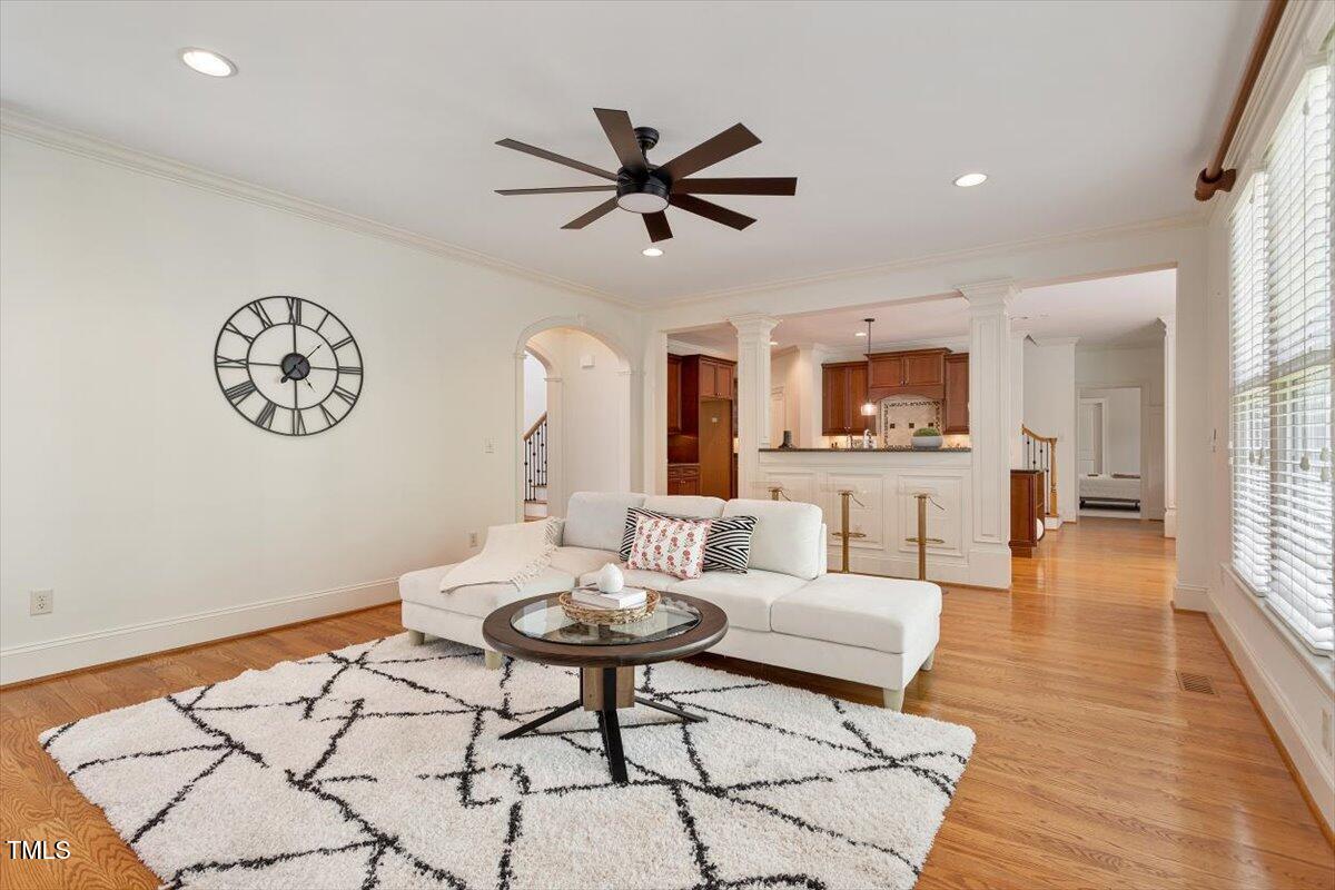 4213 Summer Brook Drive Apex, NC 27539 - Photo 15 of 78 living into kitchen