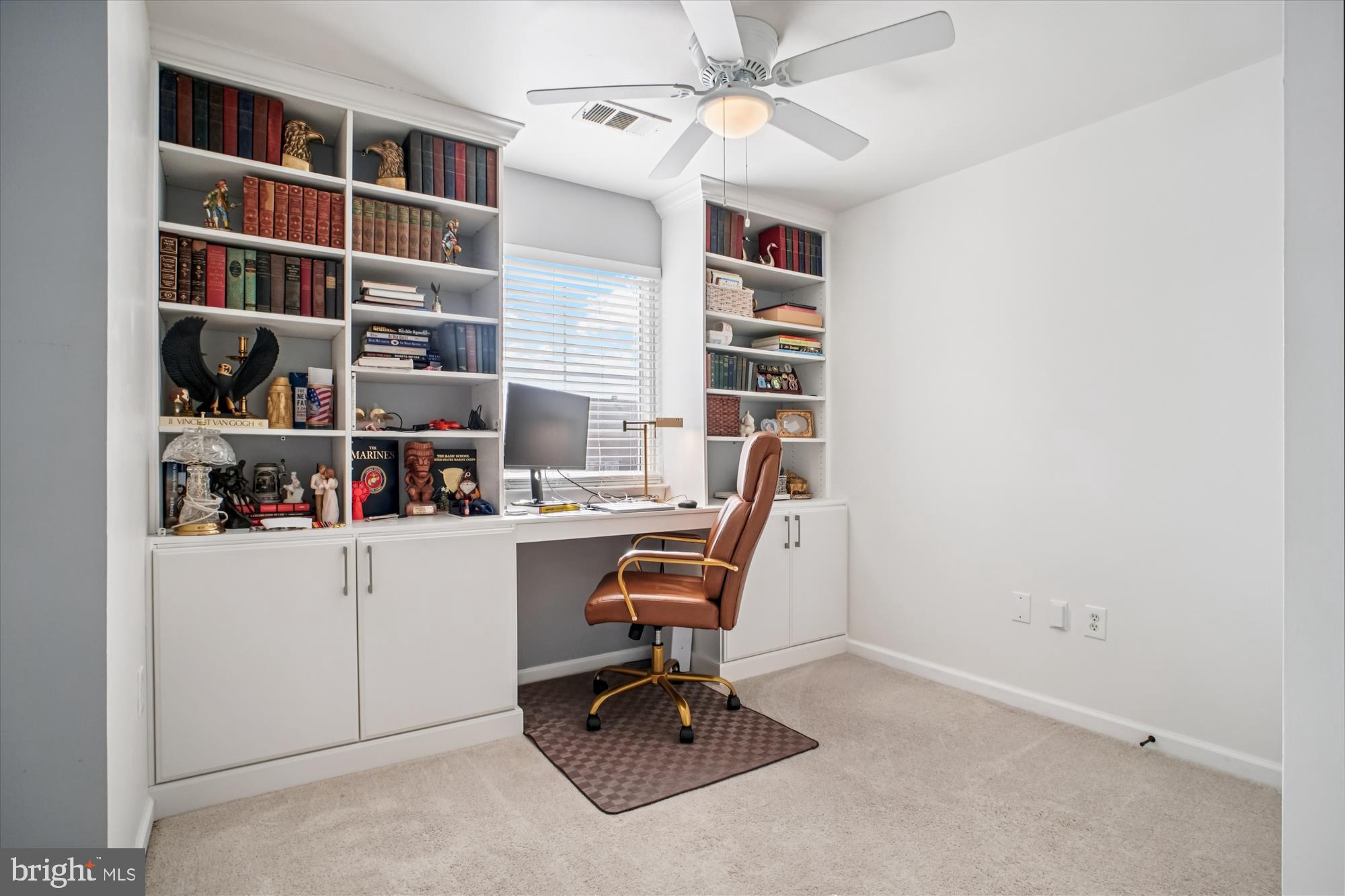 12000 Market Street, Unit 415 Reston, VA 20190 - Photo 20 of 34 a view of a workspace with furniture
