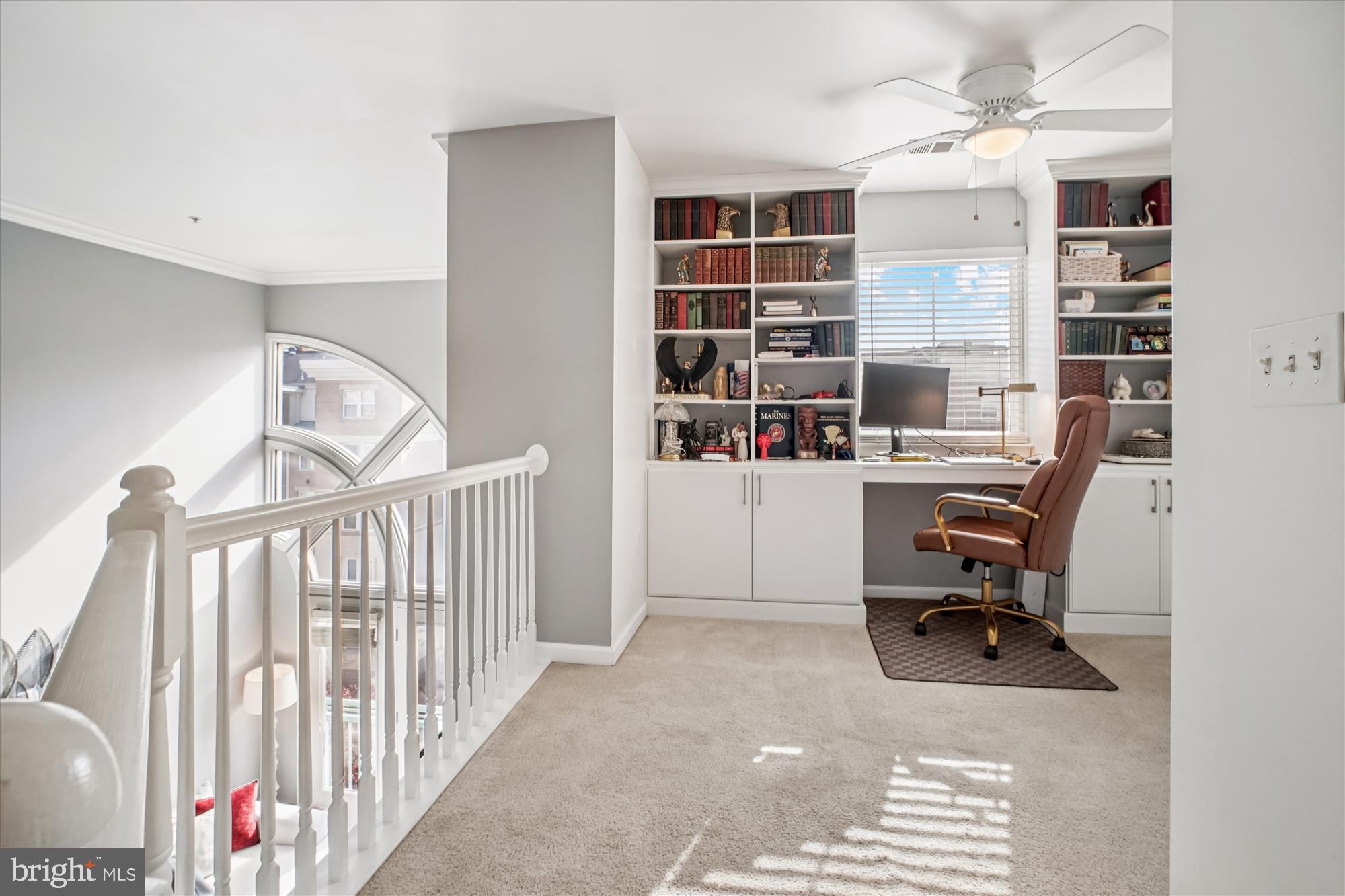 12000 Market Street, Unit 415 Reston, VA 20190 - Photo 21 of 34 a view of a workspace with furniture and a window