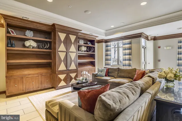a view of a hallway with cabinet