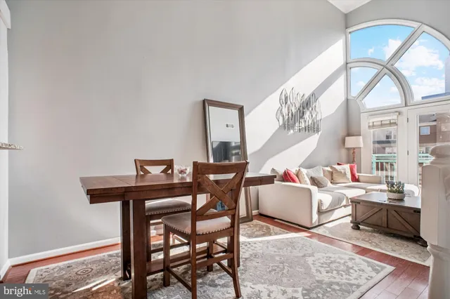 a room with a table and chairs