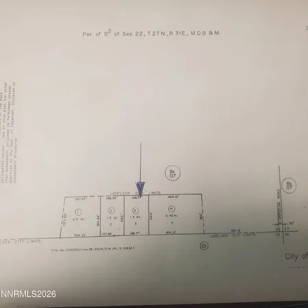 a view of a large building with a mountain in the background