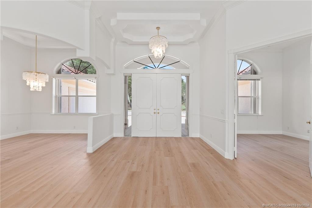 60 North River Road Stuart, FL 34996 - Photo 12 of 74 a view of empty room with wooden floor