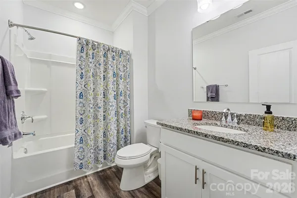 a view of a livingroom with a flat screen tv