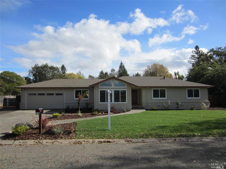 210 Willowside Road Santa Rosa, CA 95401 - Photo 1 of 1 a front view of house with yard and green space