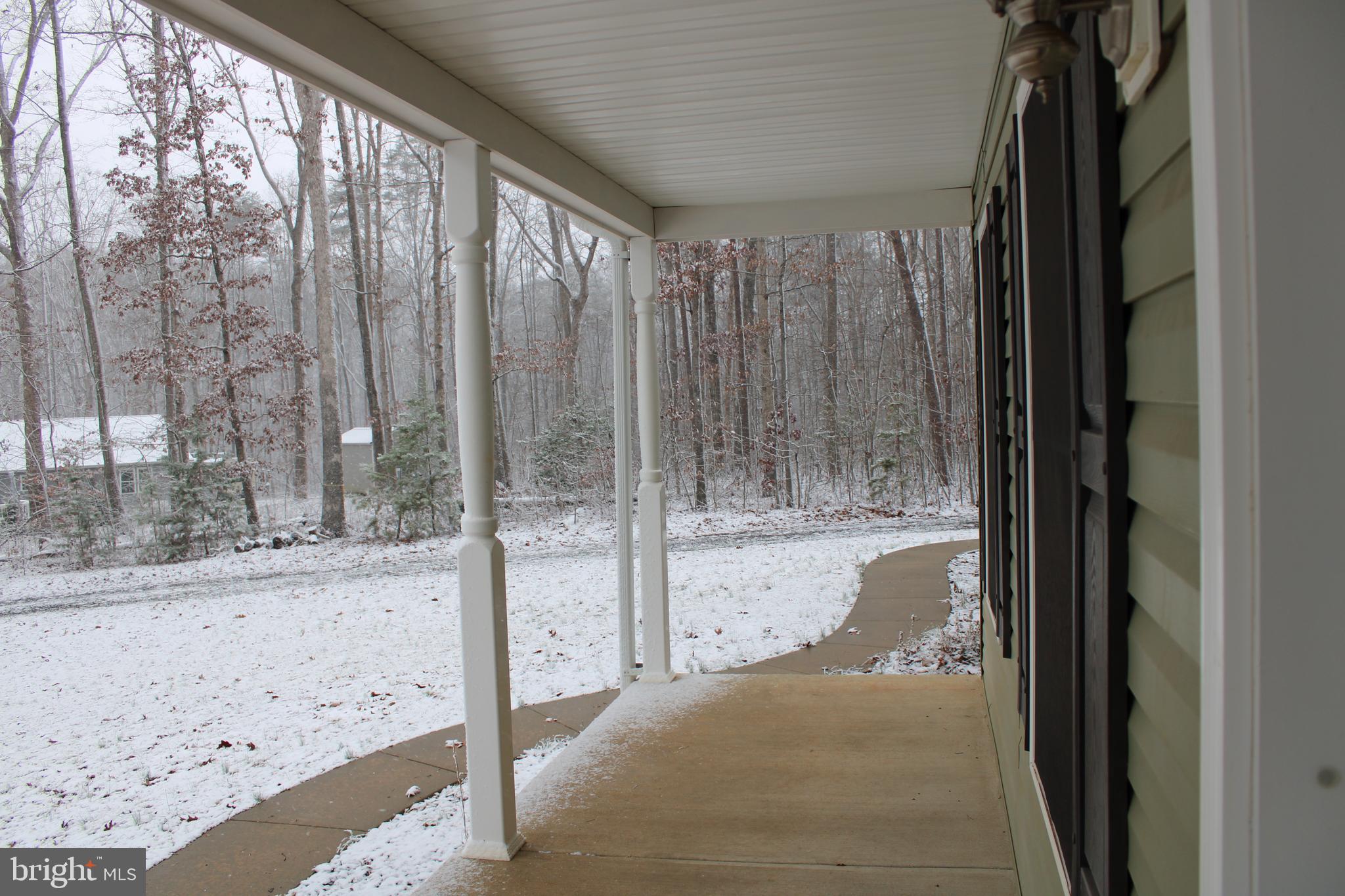 30271 Stonewall Drive Locust Grove, VA 22508 - Photo 2 of 27 a view of a glass door and a window