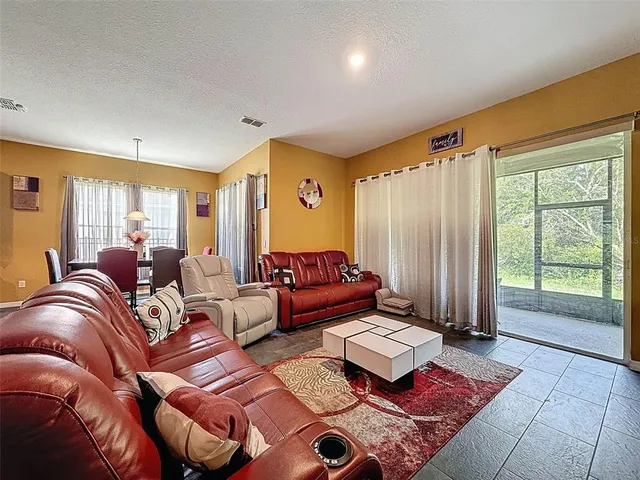 a bed room with a bed and a window