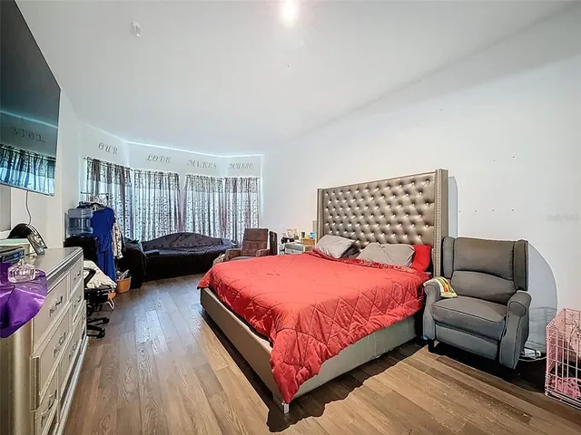 a large living room with furniture