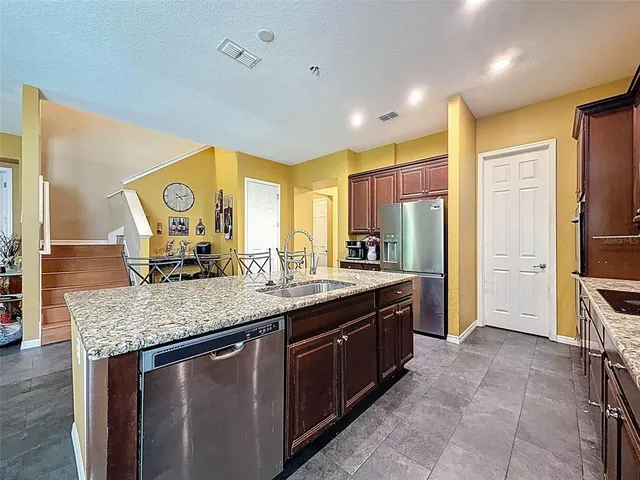 a living room with furniture and a couch