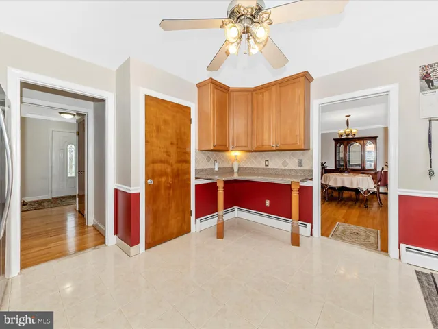 a bedroom with furniture and a chandelier