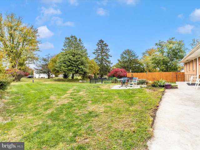 a view of swimming pool with an outdoor space and seating area