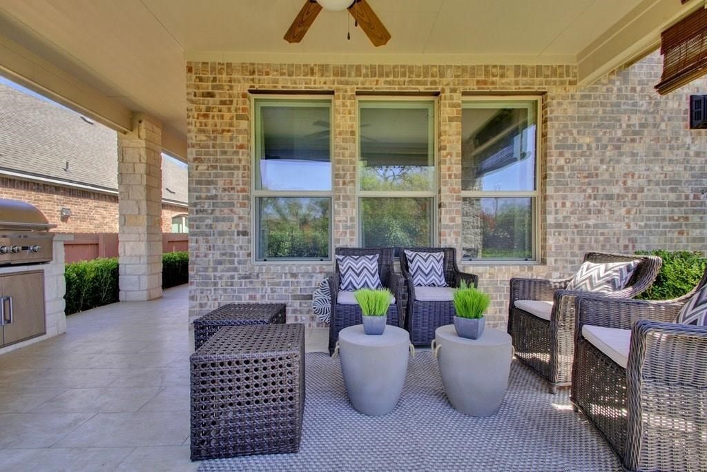 10825 Ballard Path Austin, TX 78717 - Photo 37 of 39 a view of a patio with couches and potted plants
