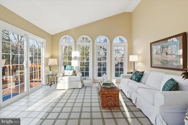 a workspace with furniture window and wooden floor