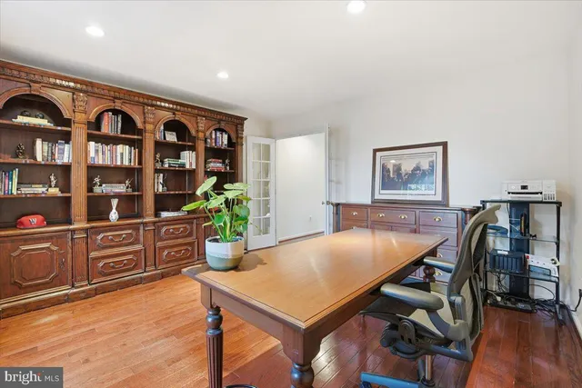 a room with a table and chairs