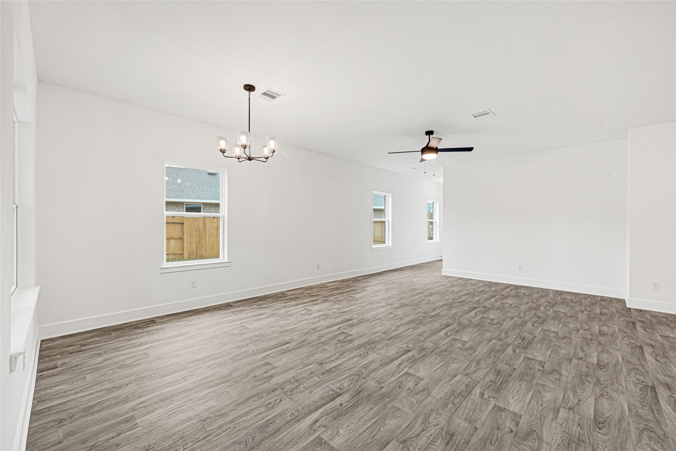 9460 Hard Rock Road Conroe, TX 77303 - Photo 8 of 28 View of Dining/Living Area from Hallway
