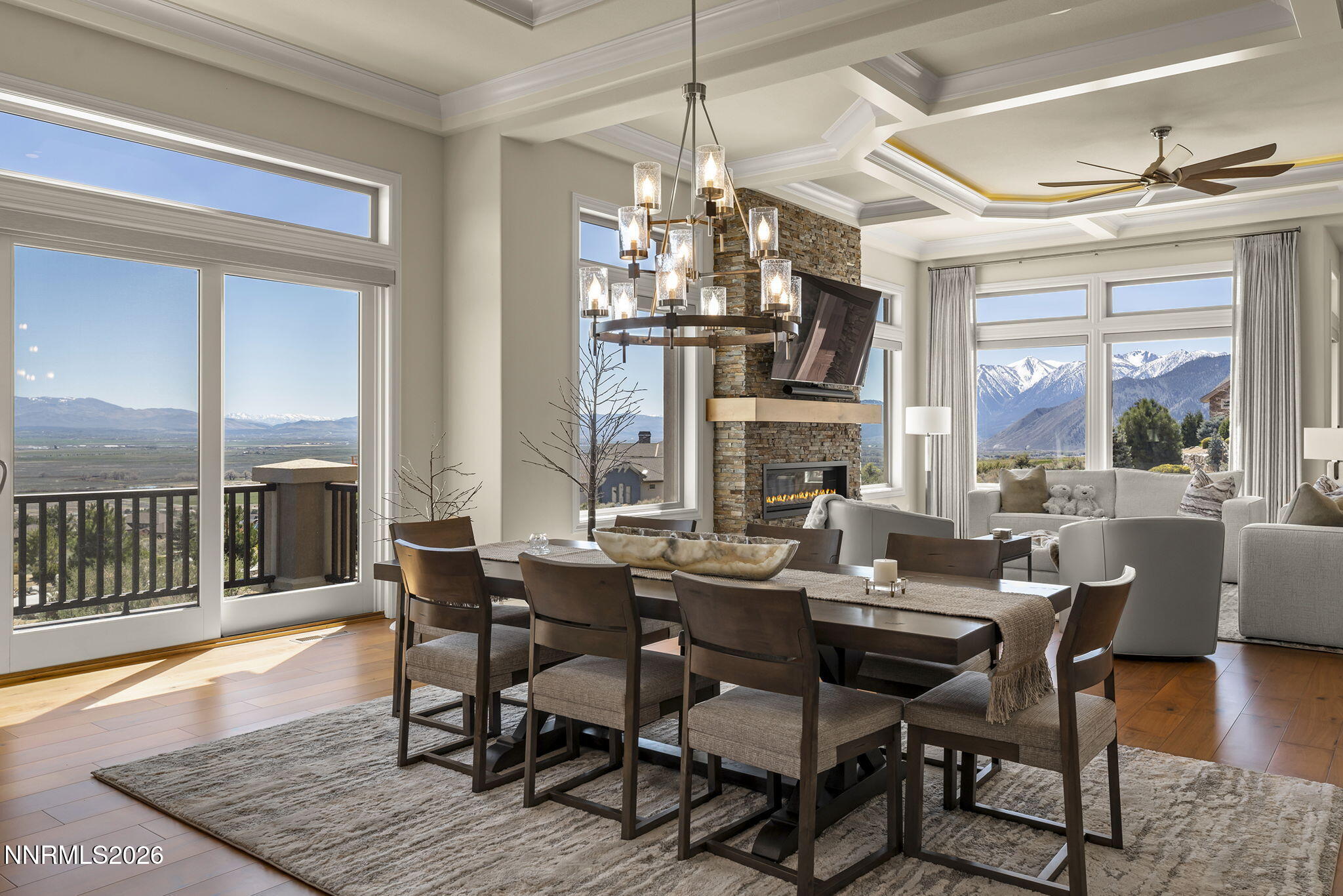 342 James Canyon Loop Genoa, NV 89411 - Photo 11 of 51 a view of a dining room with furniture window and wooden floor