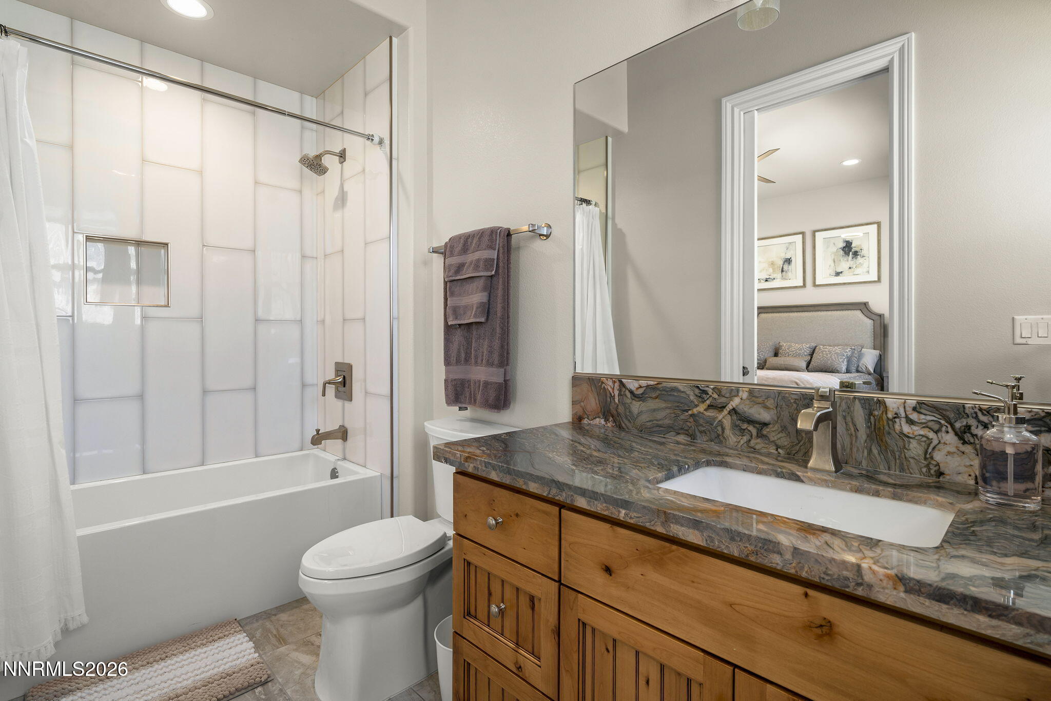342 James Canyon Loop Genoa, NV 89411 - Photo 29 of 51 a bathroom with a granite countertop sink toilet and shower