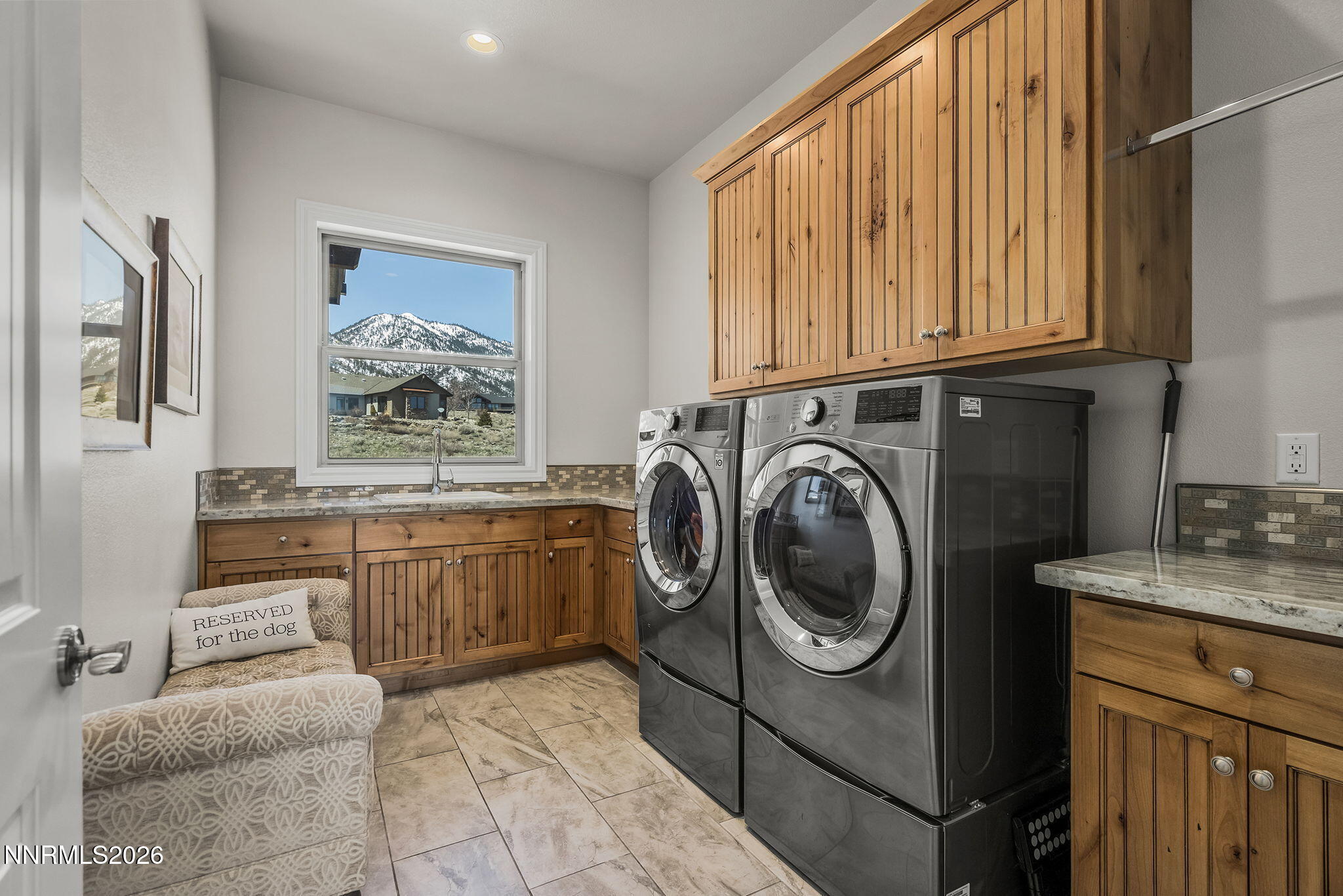342 James Canyon Loop Genoa, NV 89411 - Photo 31 of 51 a utility room with cabinets washer and dryer