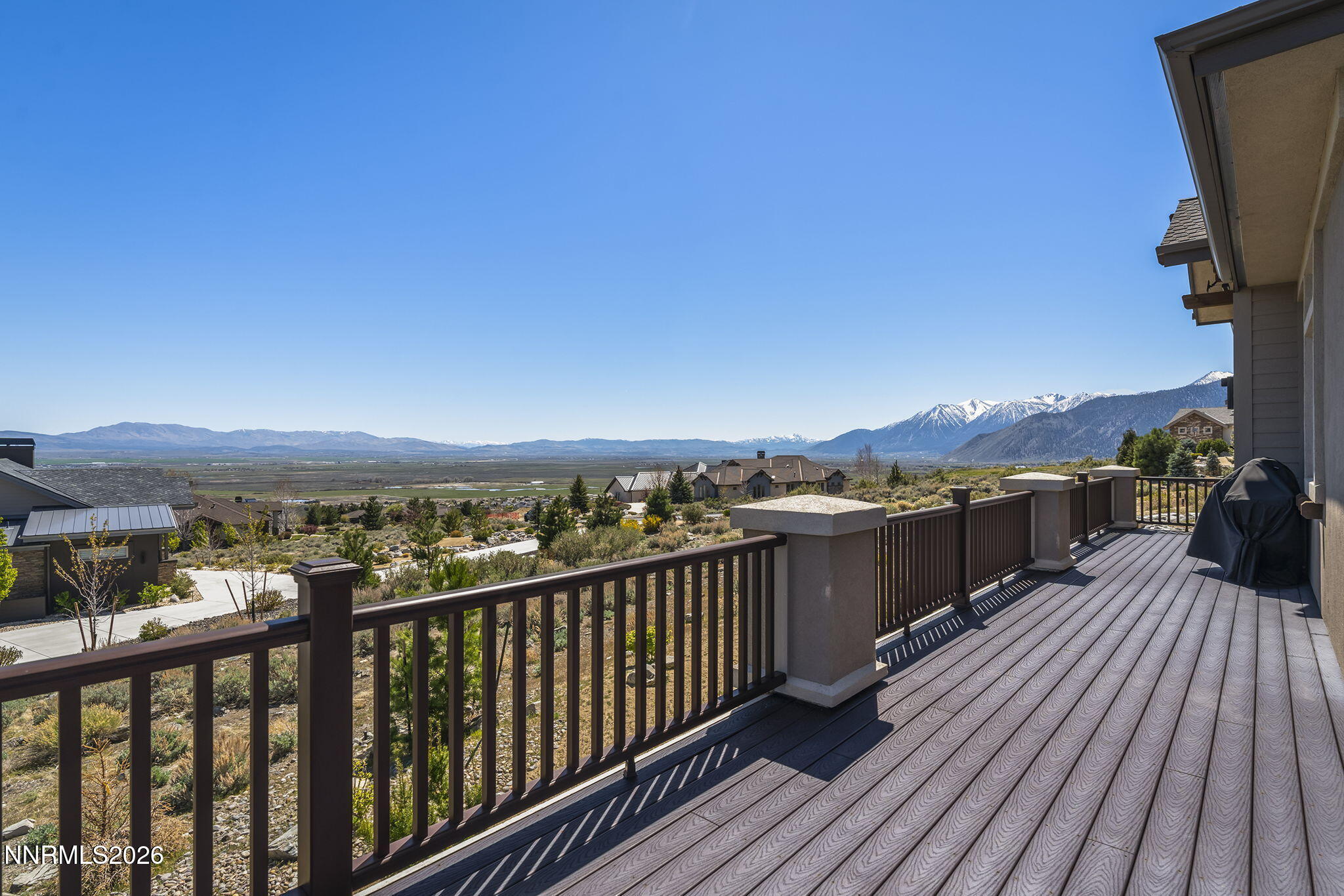 342 James Canyon Loop Genoa, NV 89411 - Photo 34 of 51 a view of a balcony with wooden floor and city view