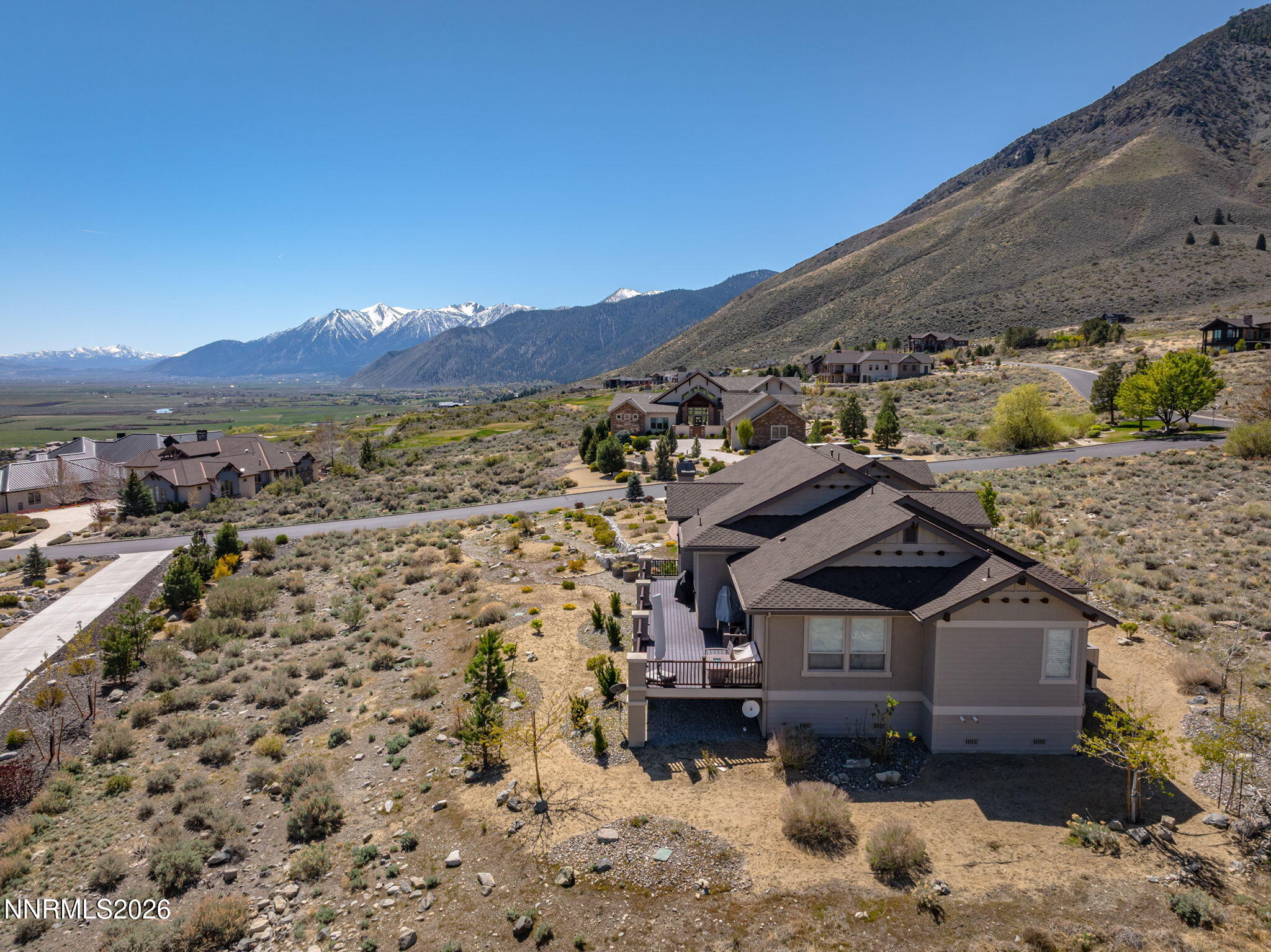 342 James Canyon Loop Genoa, NV 89411 - Photo 42 of 51 a view of a house with a yard