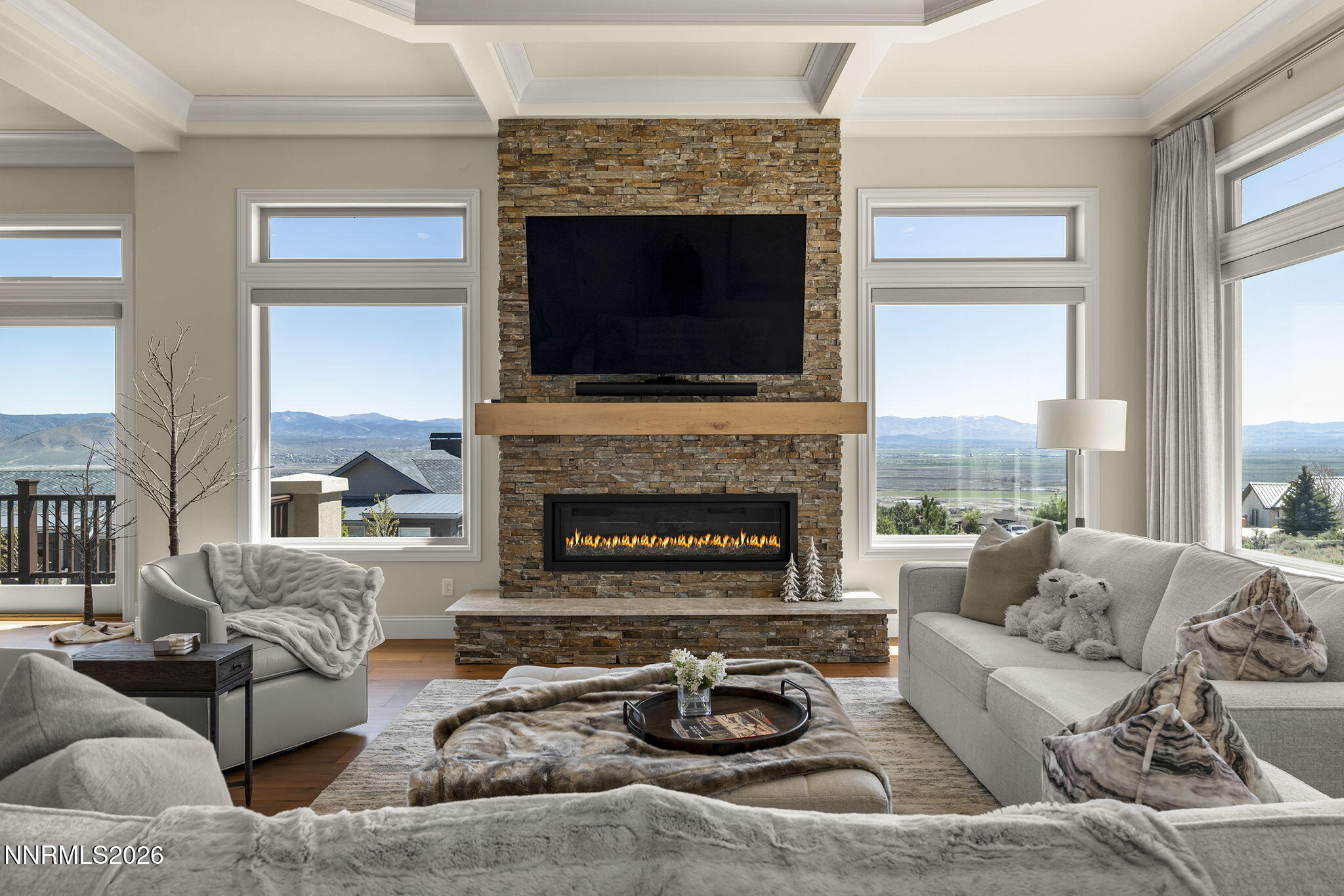 342 James Canyon Loop Genoa, NV 89411 - Photo 7 of 51 a living room with furniture and a fireplace