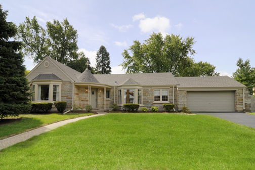 718 North President Street Wheaton, IL 60187 - Photo 1 of 1 a front view of house with yard and green space