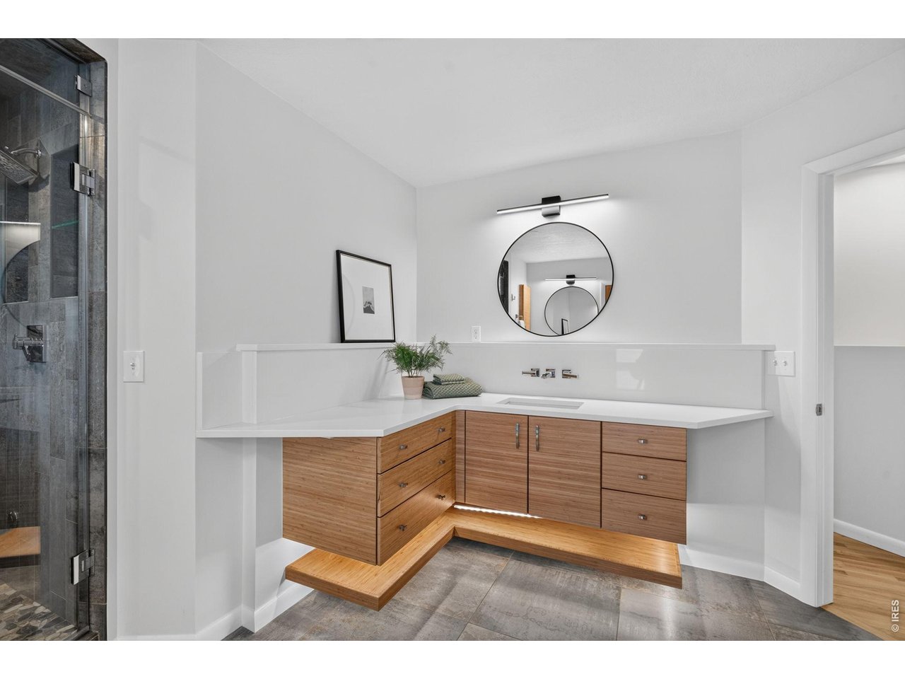 1118 Ridgelawn Drive Fort Collins, CO 80521 - Photo 15 of 48 Just steps away is the En-Suite Bathroom with dual vanities and incredible oversized tile flooring that includes radiant heat