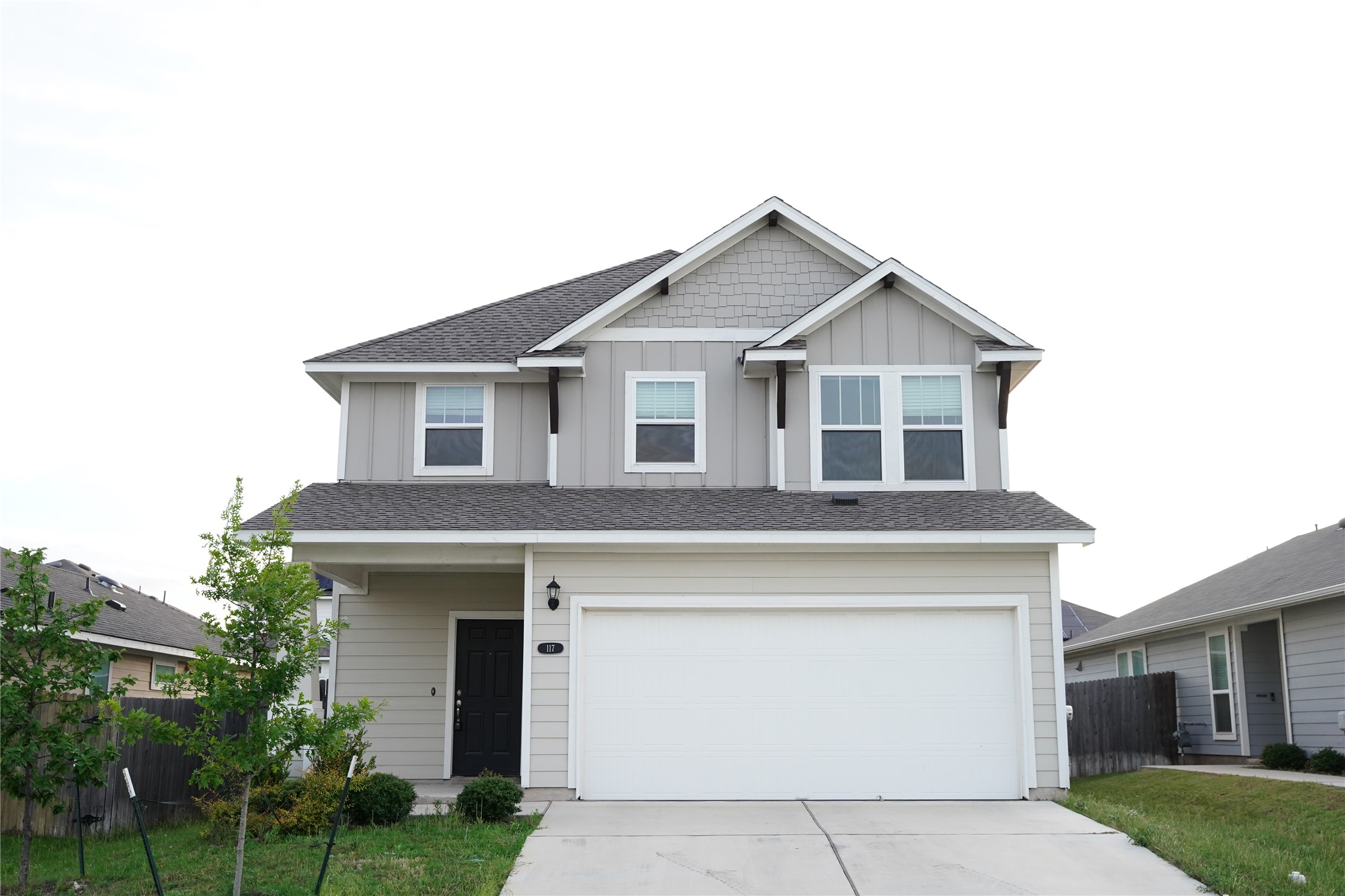 117 Crescent Street Georgetown, TX 78626 - Photo 1 of 38 A welcoming two-story dwelling features a spacious attached garage and contemporary exterior siding.