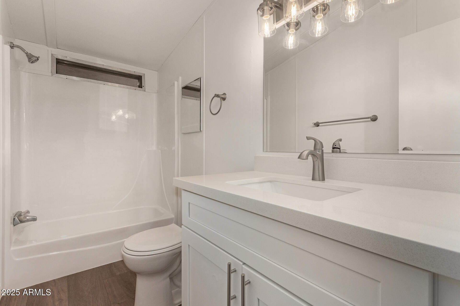 1730 East 21st Avenue Apache Junction, AZ 85119 - Photo 19 of 25 a bathroom with a sink a toilet and shower