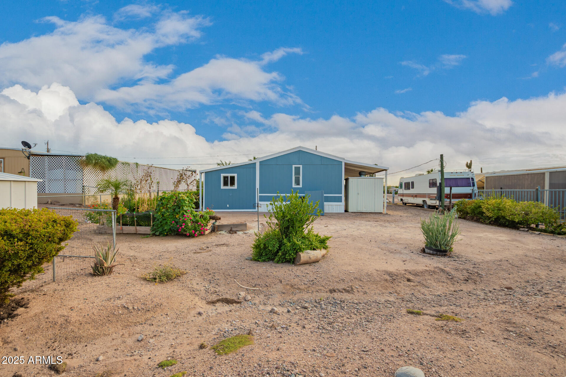 1730 East 21st Avenue Apache Junction, AZ 85119 - Photo 23 of 25 a view of a house with a patio