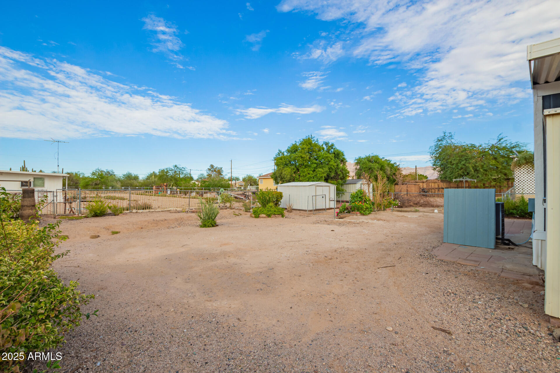 1730 East 21st Avenue Apache Junction, AZ 85119 - Photo 25 of 25 a view of a road with a building in the background