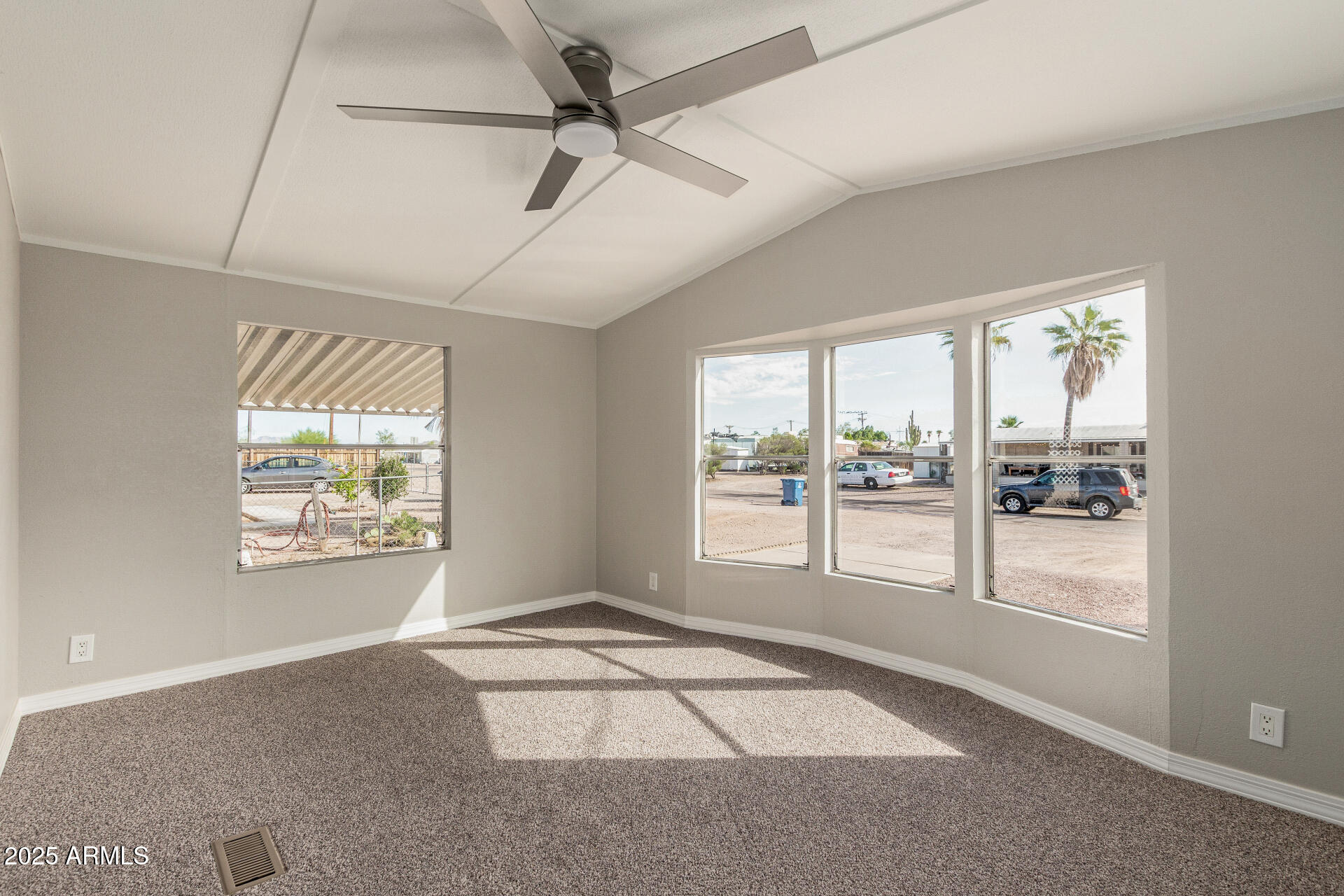 1730 East 21st Avenue Apache Junction, AZ 85119 - Photo 7 of 25 a view of an empty room and window