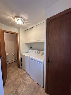a room with a washer and dryer