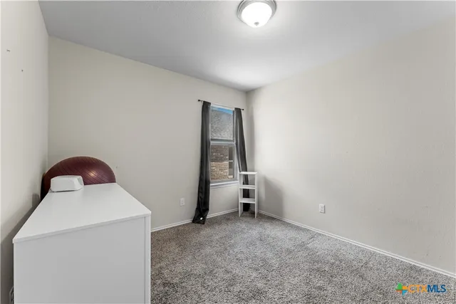 a bathroom with a toilet a sink and bathtub