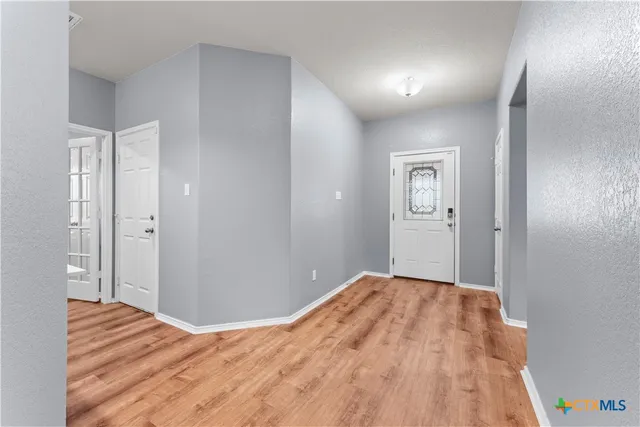 a view of a livingroom with furniture and window