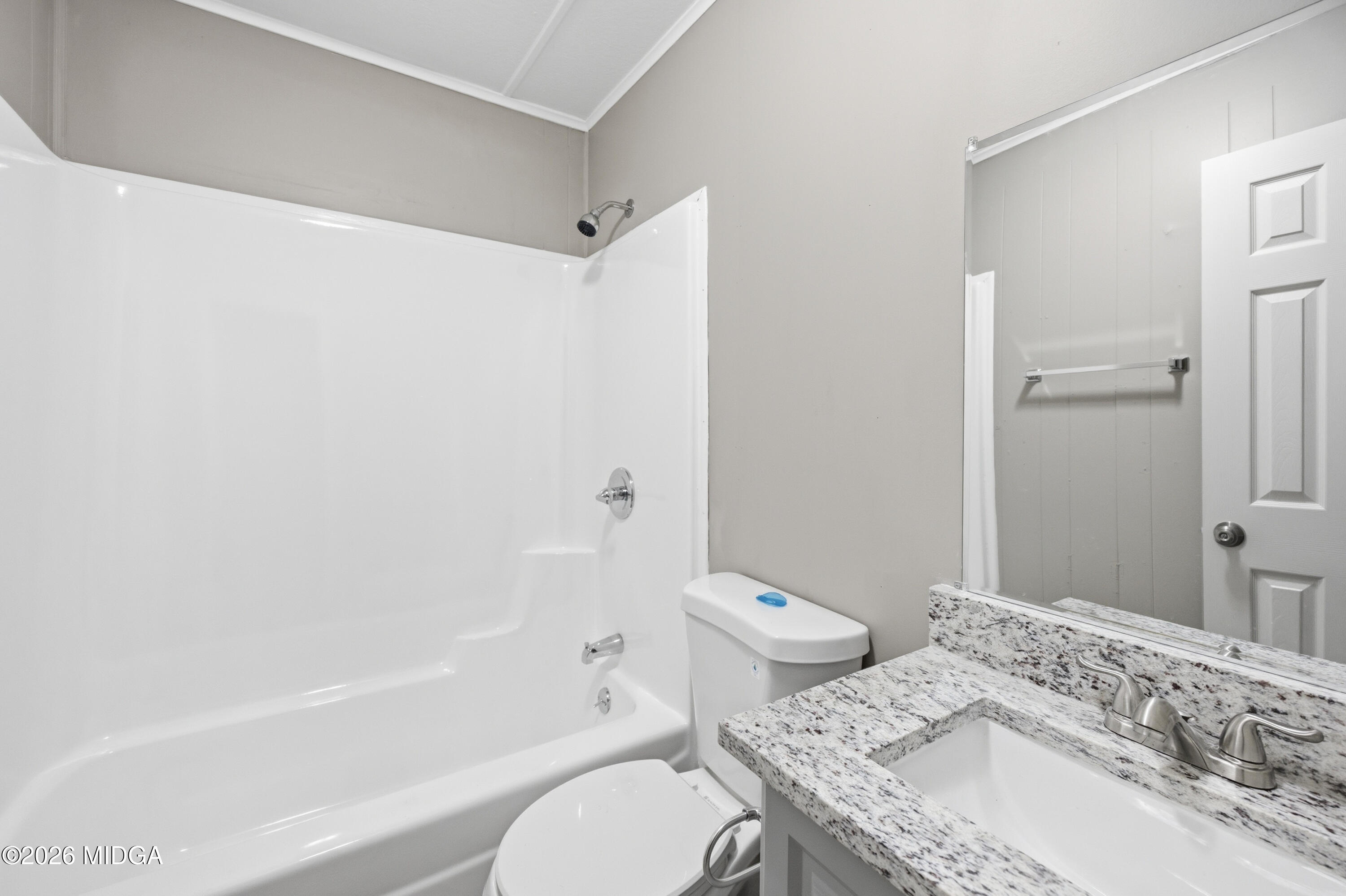 427 Gun Club Road Fort Valley, GA 31030 - Photo 13 of 26 a bathroom with a granite countertop sink toilet and shower