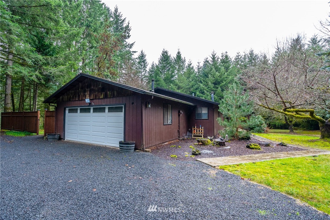 191 Tingle Road Winlock, WA 98596 - Photo 2 of 39 a view of a house with backyard and trees