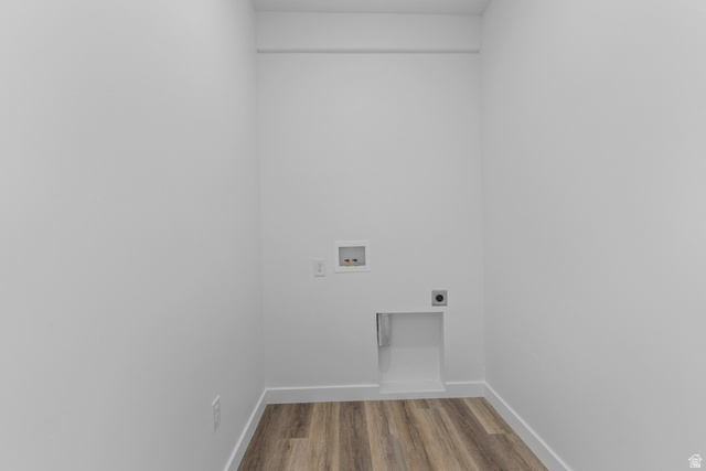2823 North 710 West, Unit 16 Logan, UT 84321 - Photo 22 of 22 Laundry area featuring light wood-style flooring, washer hookup, and hookup for an electric dryer