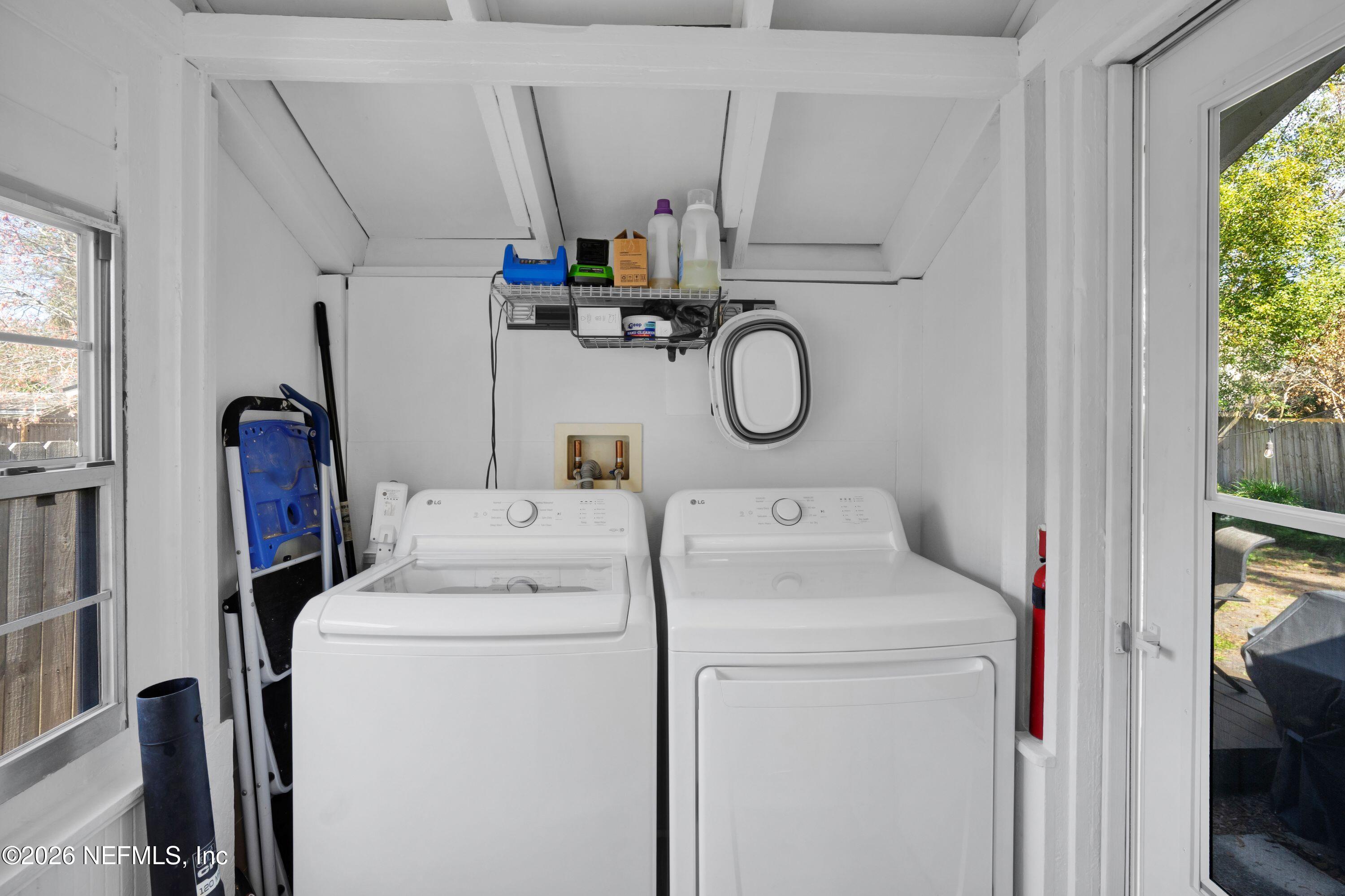 1273 Dancy Street Jacksonville, FL 32205 - Photo 17 of 30 a view of storage and utility room with washer and dryer