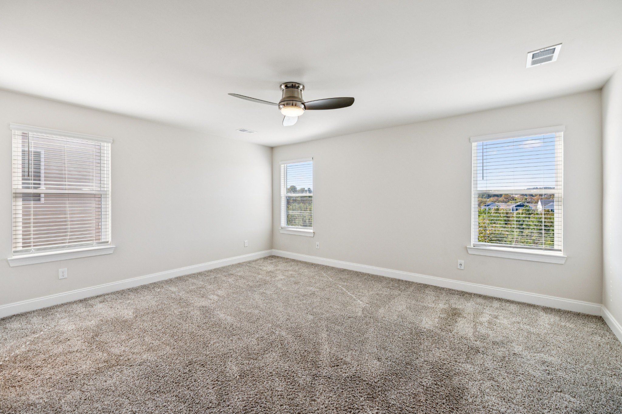 359 Coleman Court Columbia, TN 38401 - Photo 18 of 24 an empty room with windows and fan