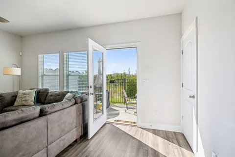 a living room with furniture and a couch