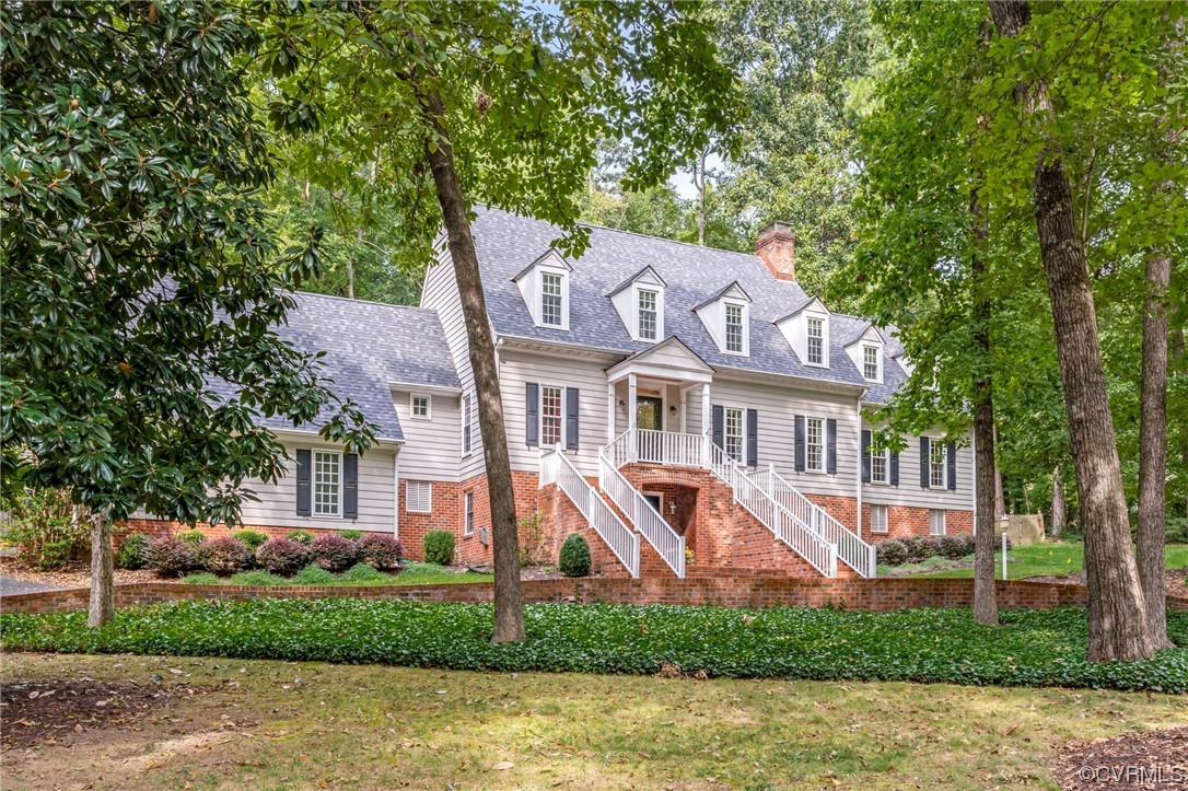 2320 Dorking Road North Chesterfield, VA 23236 - Photo 1 of 42 a front view of a house with a yard and a tree